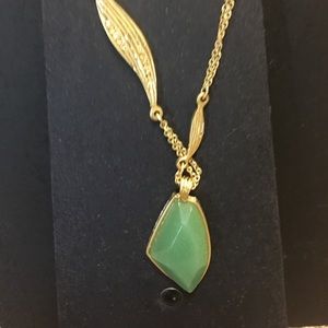 C & I gold leaf necklace w/  green stone.